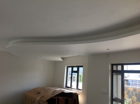 Curvy Gypsum False Ceiling Bulkhead and Lightcove